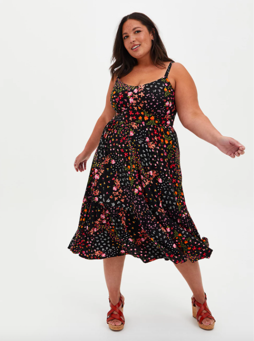 A model wearing the floral midi dress