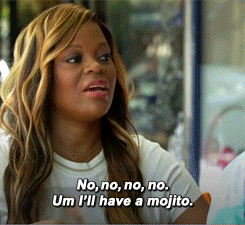 A woman saying she&#x27;ll have a mojito