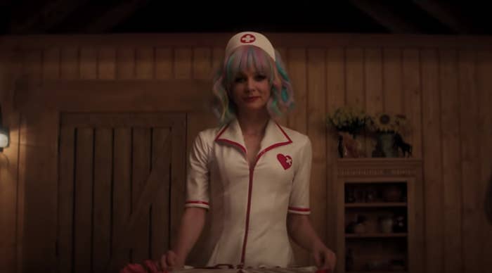 Carey Mulligan dressed as a nurse, pretending to be a stripper in &quot;Promising Young Woman&quot;