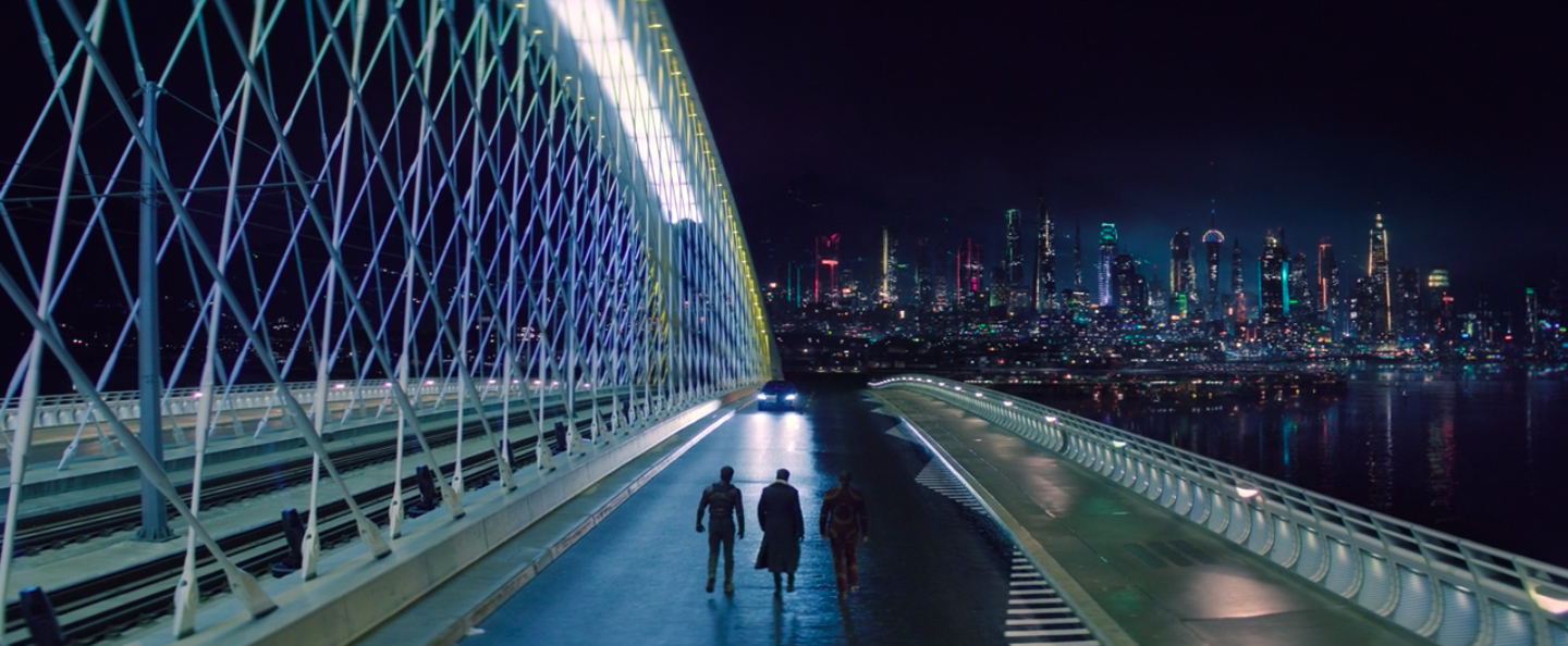 Sebastian Stan, Daniel Brühl, and Anthony Mackie walking on a basically empty bridge