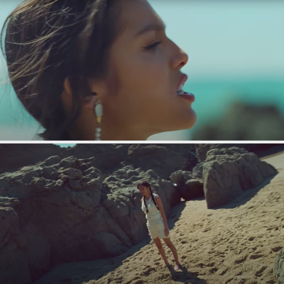 Olivia standing on a beach