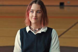 Saorise Ronan in "Lady Bird" with a smug smile on her face