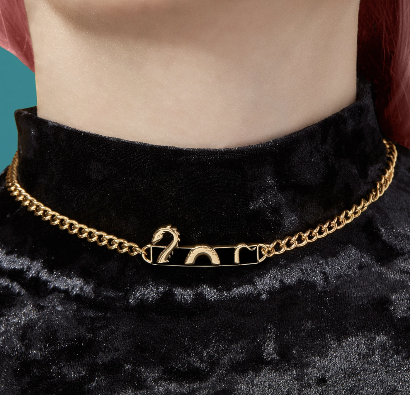 model with turtleneck with a Loch Ness monster choker layered on top of it
