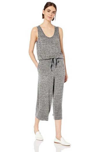 model wearing the jumpsuit in heather gray
