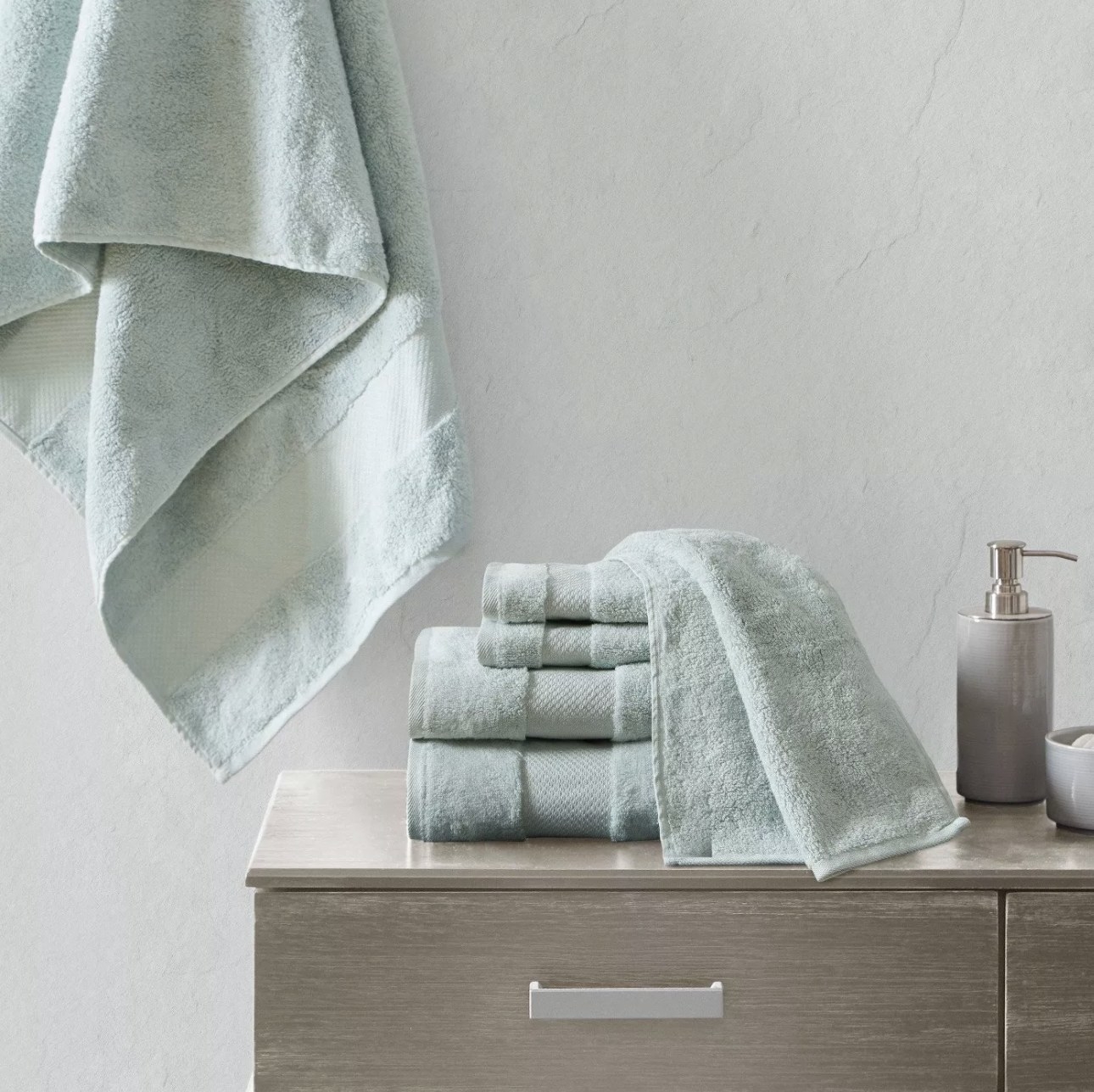 Set of bath towels on bathroom counter