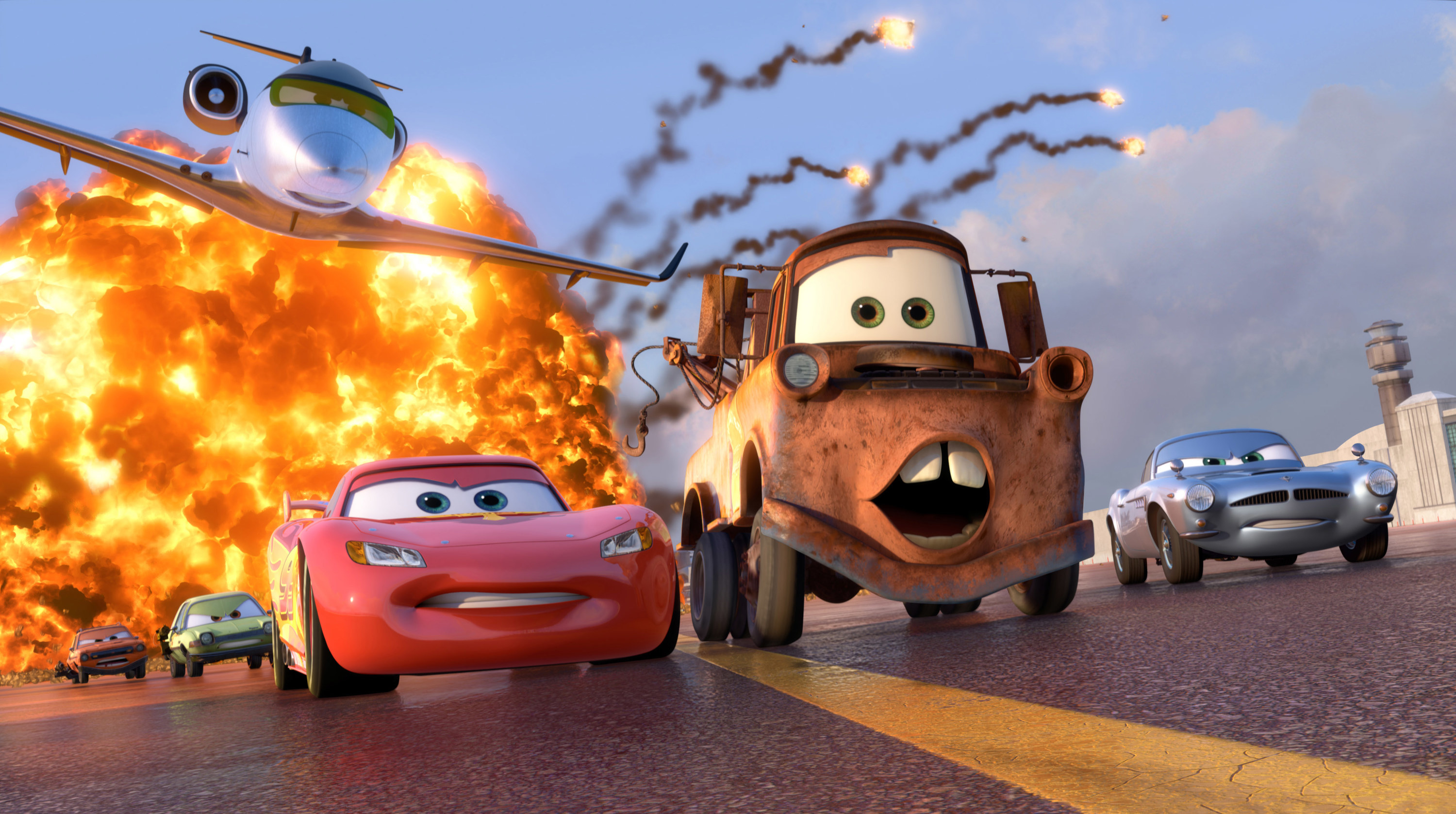 Photo of Lighting and Mater being chased on bridge in Cars 2