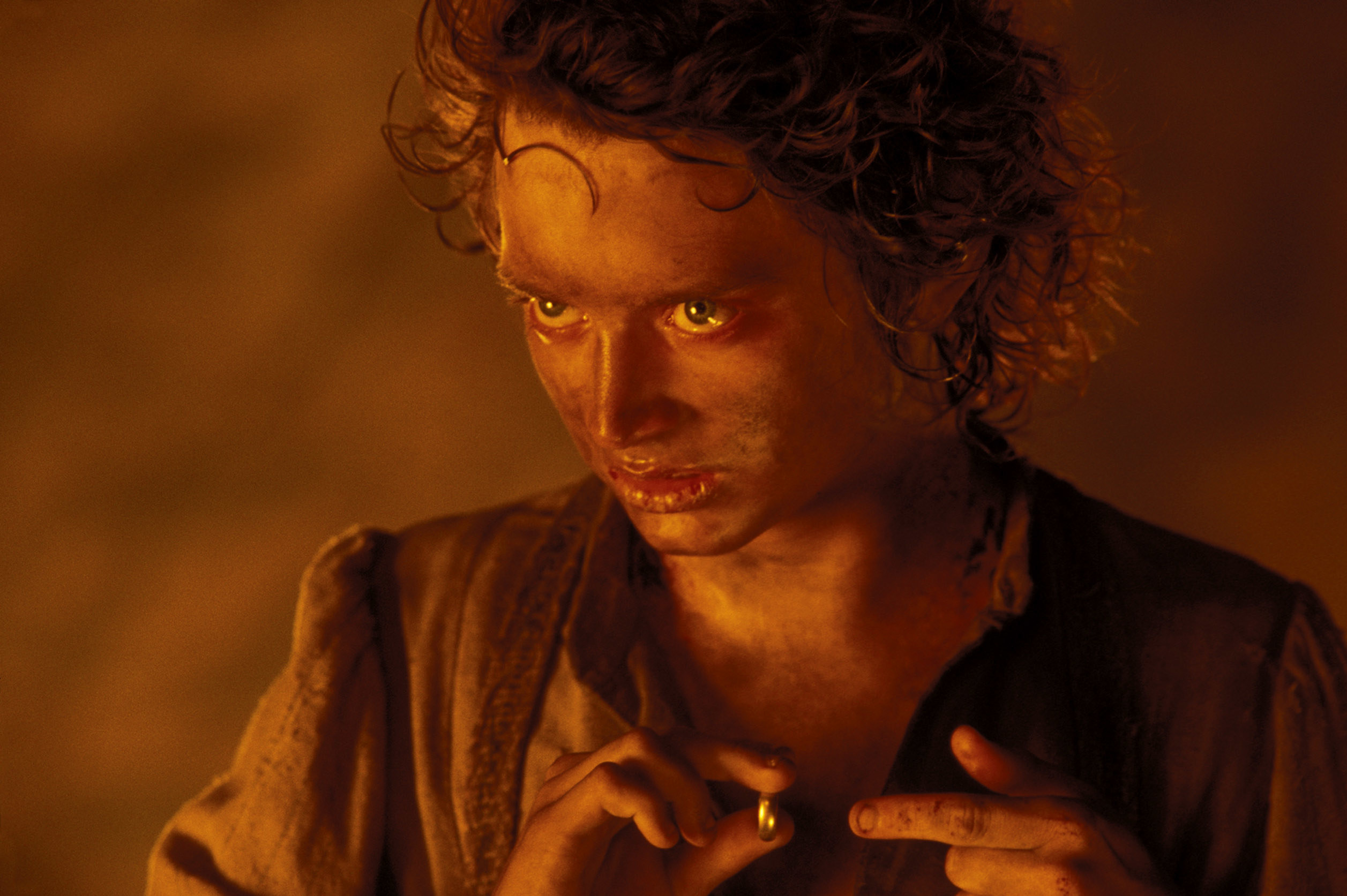 Photo of Frodo about to put on the ring