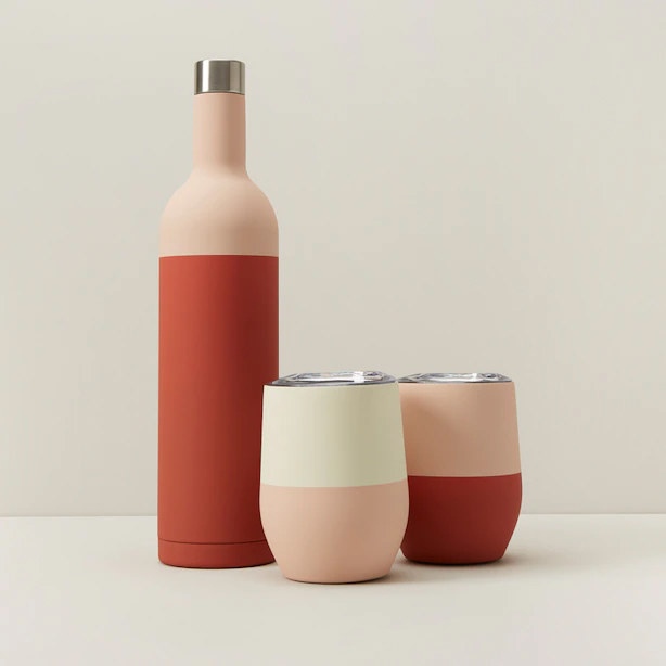 A stainless steel wine bottle and two small tumblers