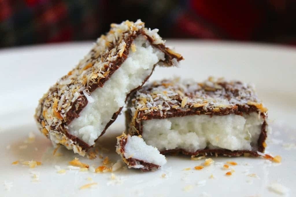 Chocolate-covered rectangular bars containing a hard and textured coconut and potato filling