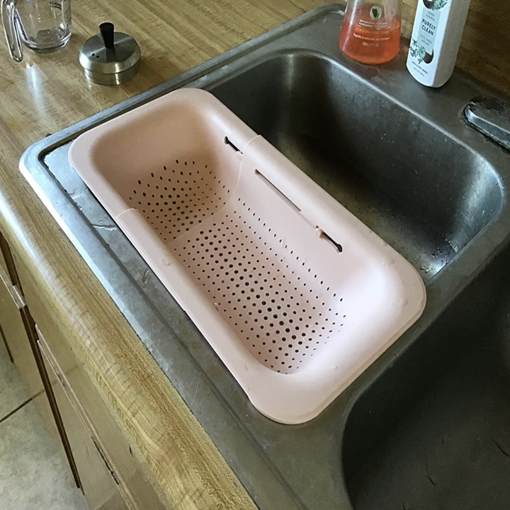 photo of pink strainer over sink 