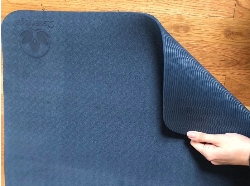 A blue yoga mat in a reviewer&#x27;s home