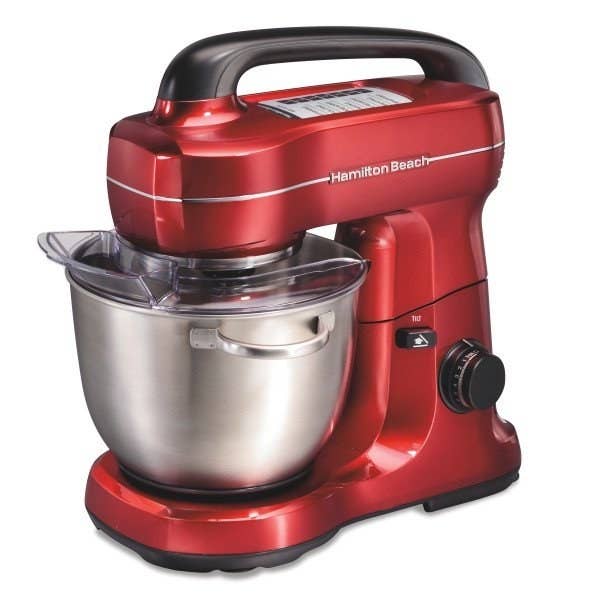 The standing mixer, with silver bowl and red body