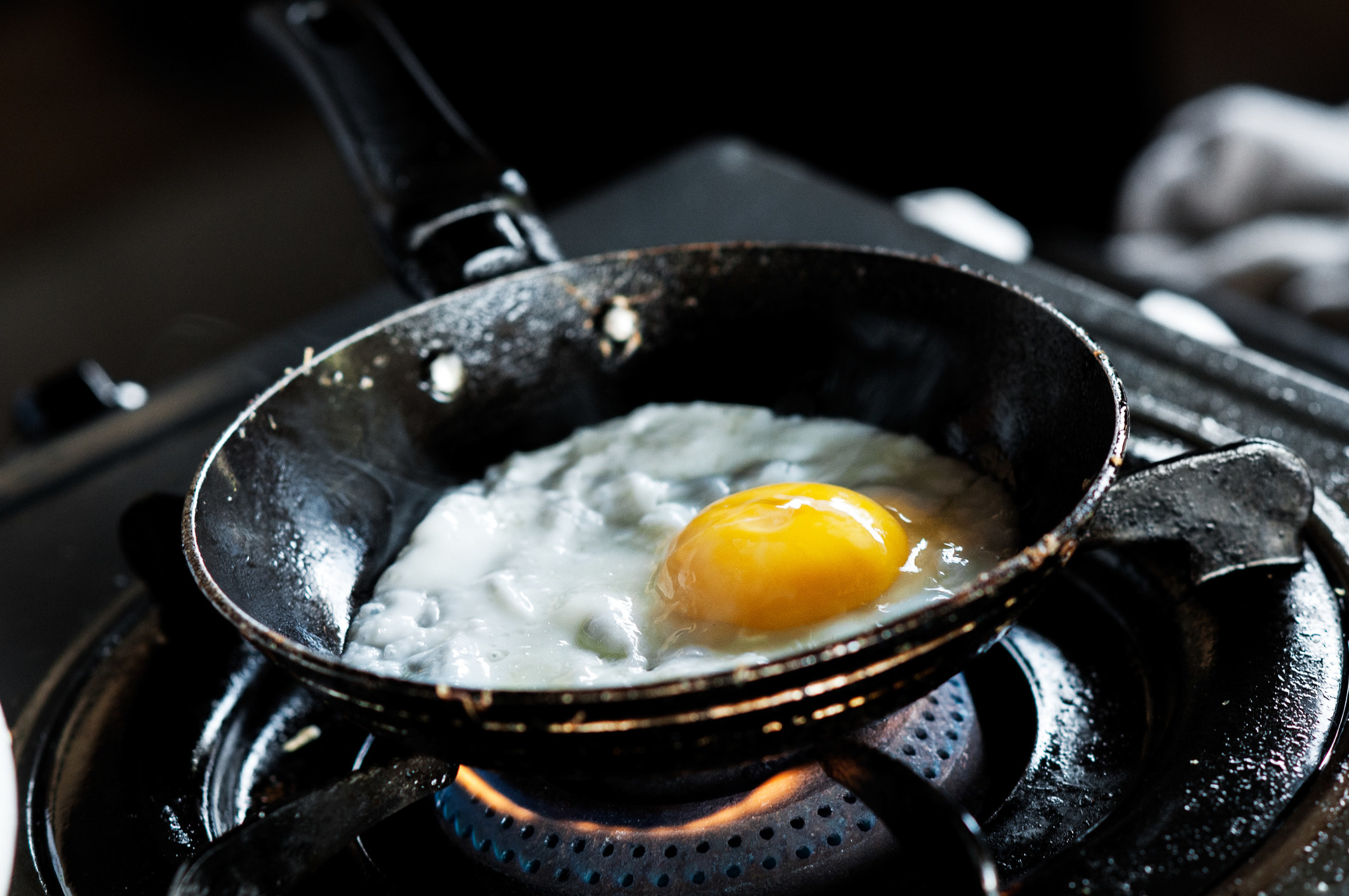 fried egg being cooked