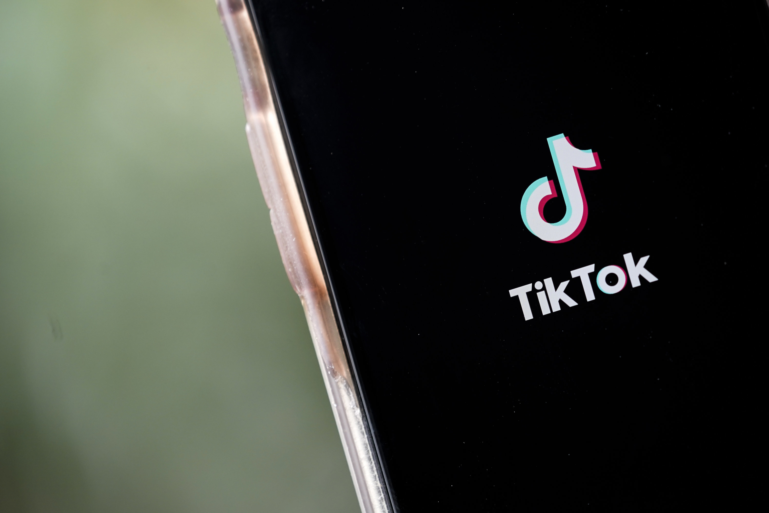 The TikTok app opening on a smartphone