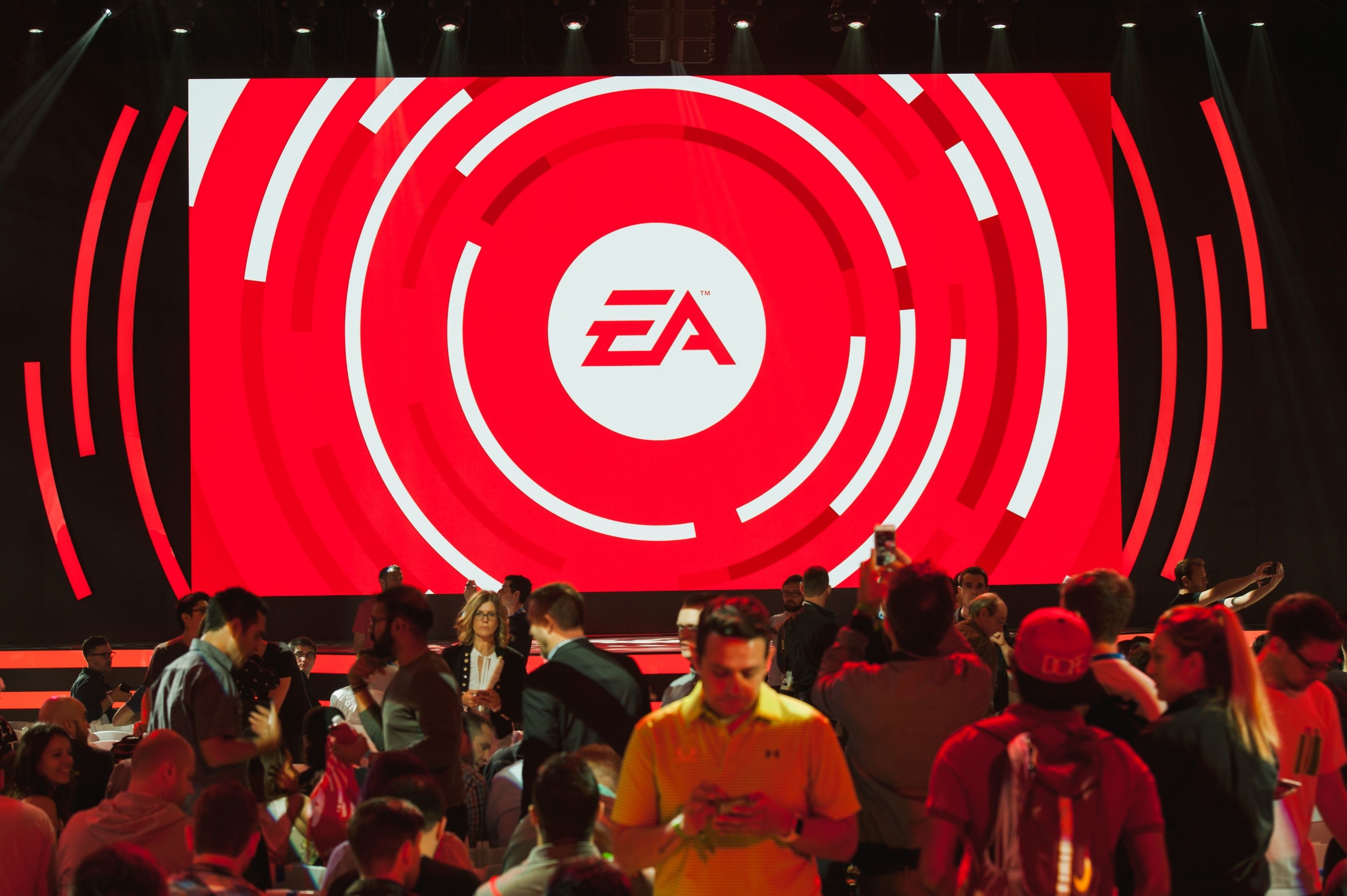 A screen showing the EA logo at a convention