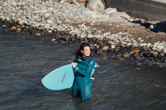 A woman surfing in the Truckee River