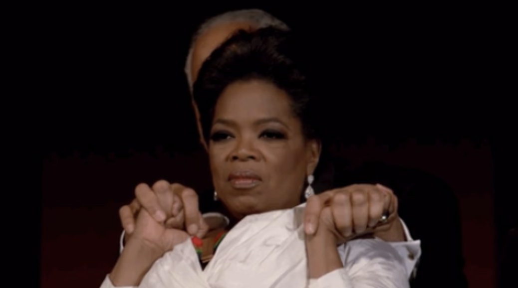 Oprah holding Stedman&#x27;s hands