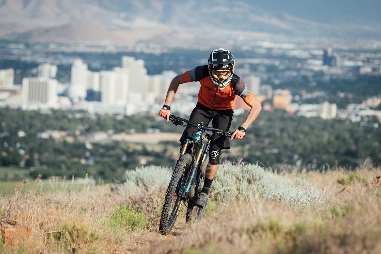 A man mountain biking in Reno