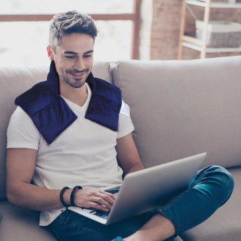 Front view of another model wearing it showing it drape over the chest 