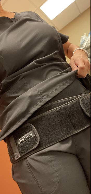 Closeup of reviewer in belt to show velcro straps 