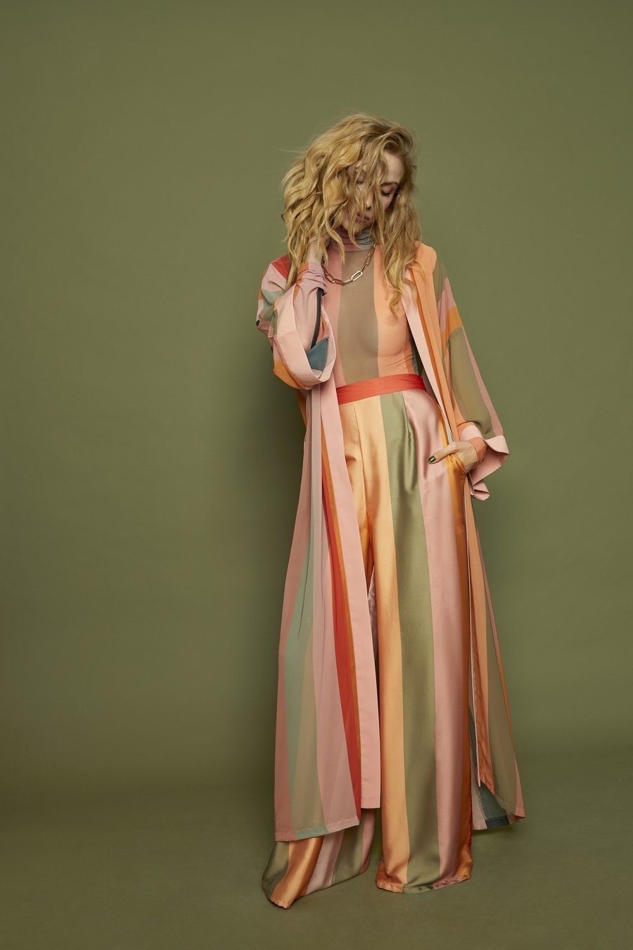 A model wearing the pants with the matching robe