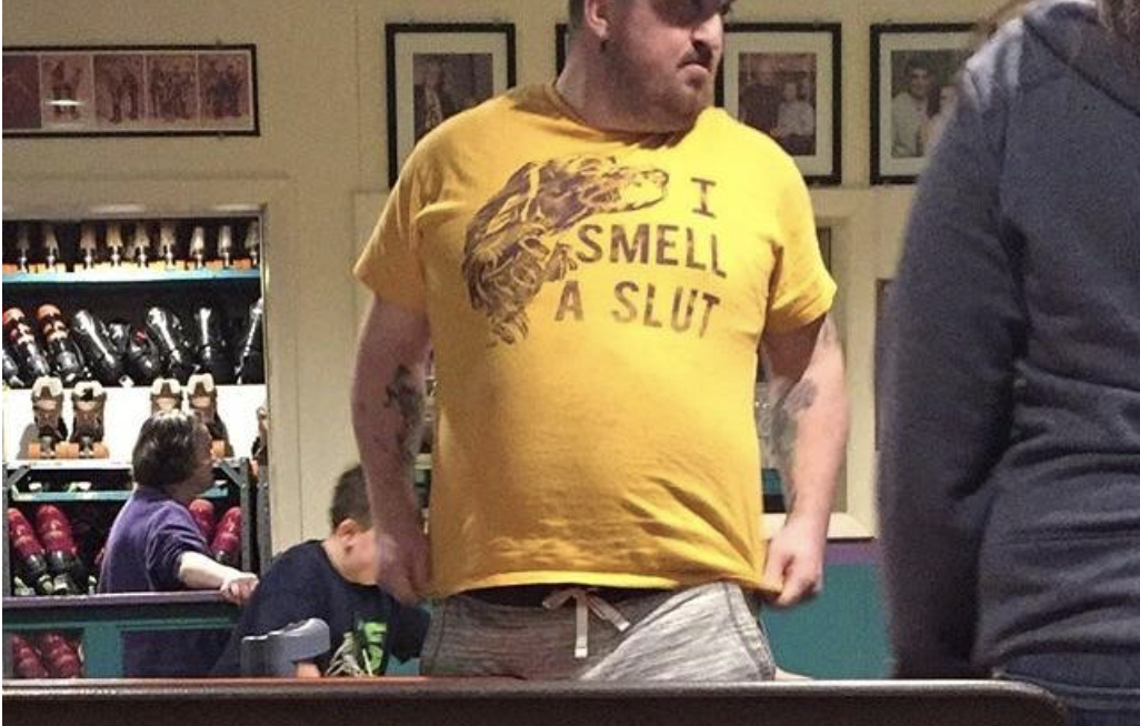A man&#x27;s shirt reads I smell a slut