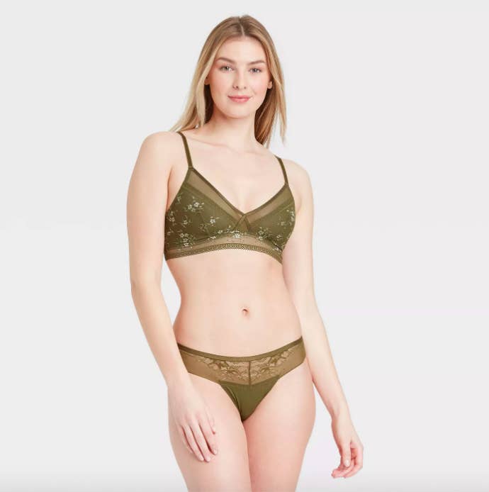 A model wearing the set in green