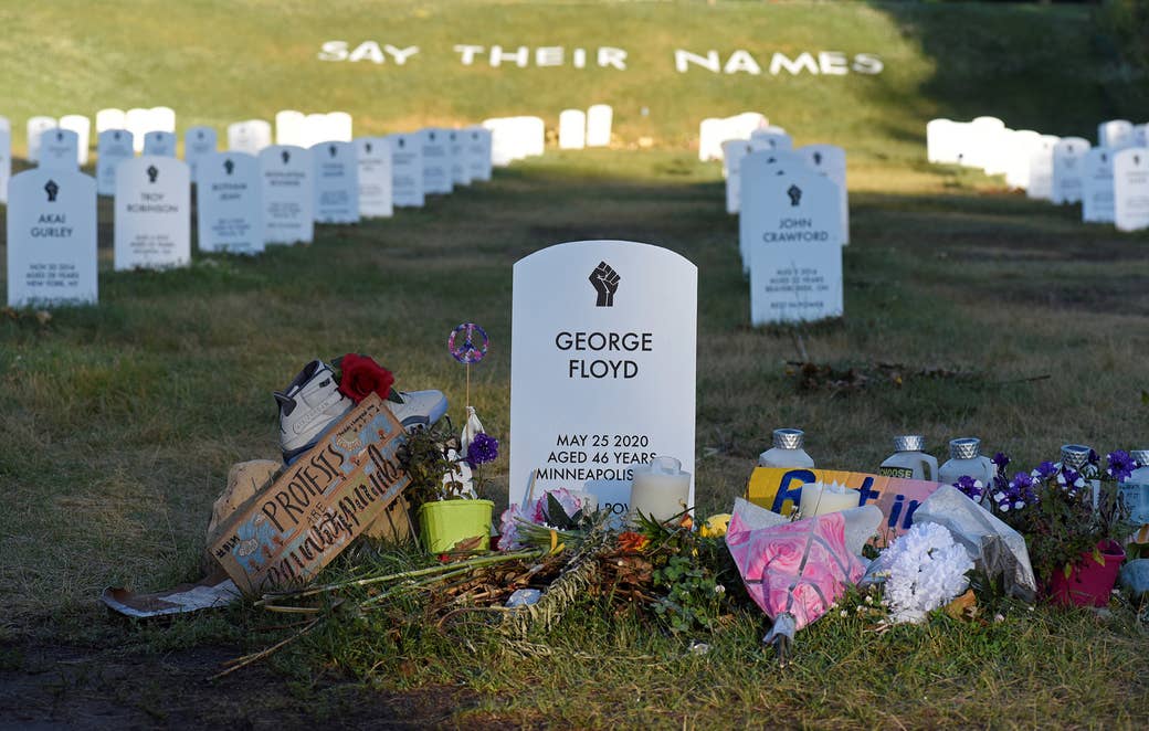 Flowers are placed at a tombstone engraved with George Floyd&#x27;s name and date of death