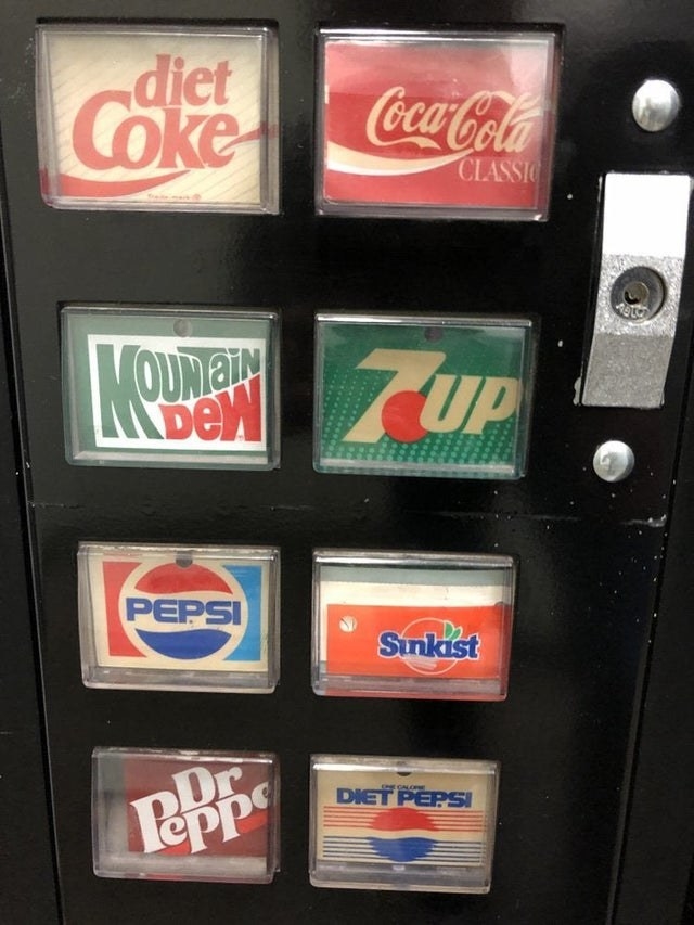 The buttons of an old &#x27;80s vending machine
