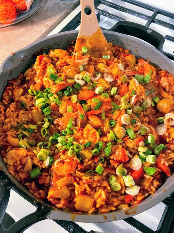 pan filled with rice and shrimp