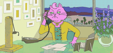 Princess Carolyn clears off the contents of her desk into a briefcase after hurriedly hanging up the phone before rushing out of frame.