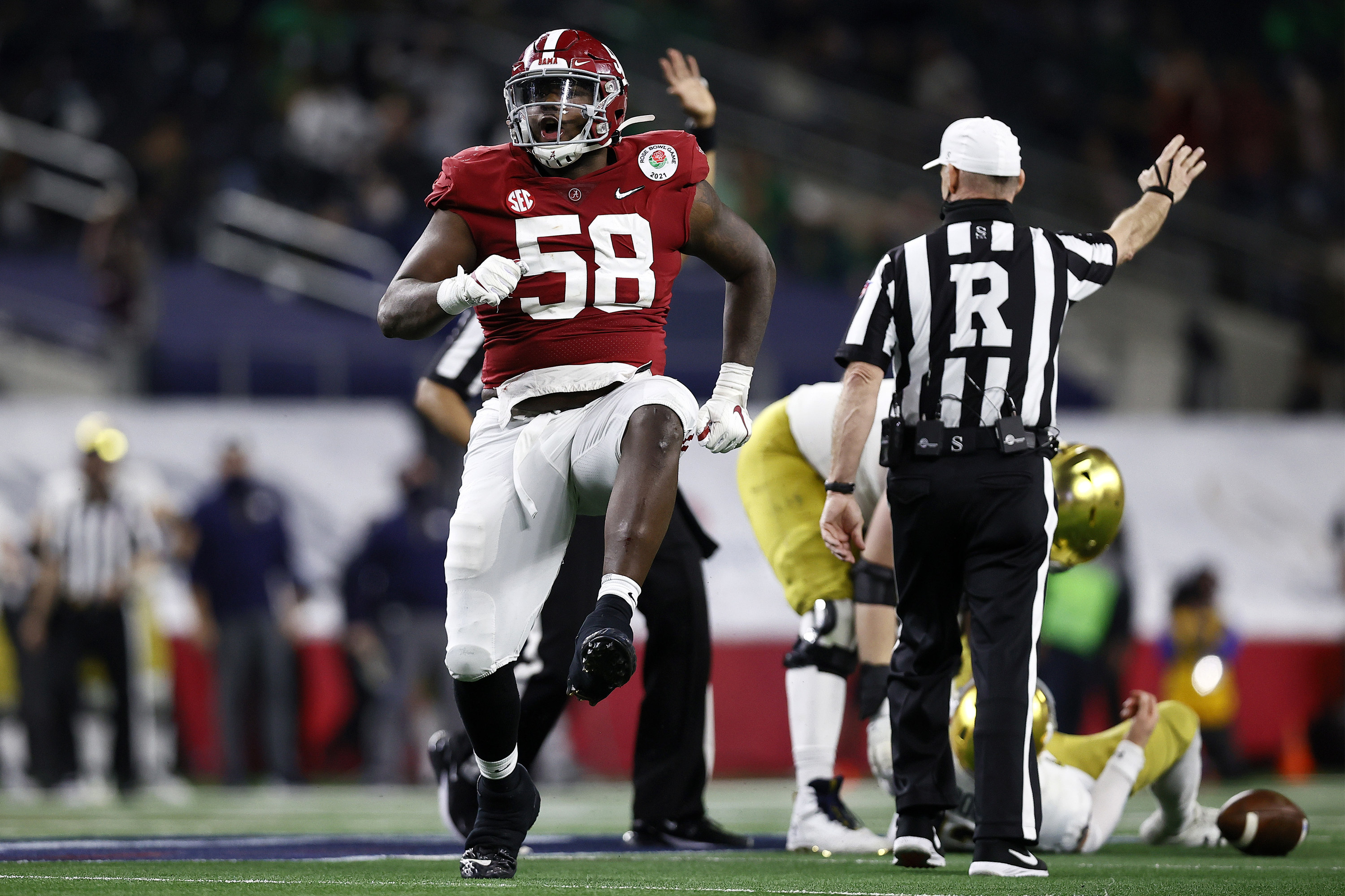 Christian Barmore celebrating a sack