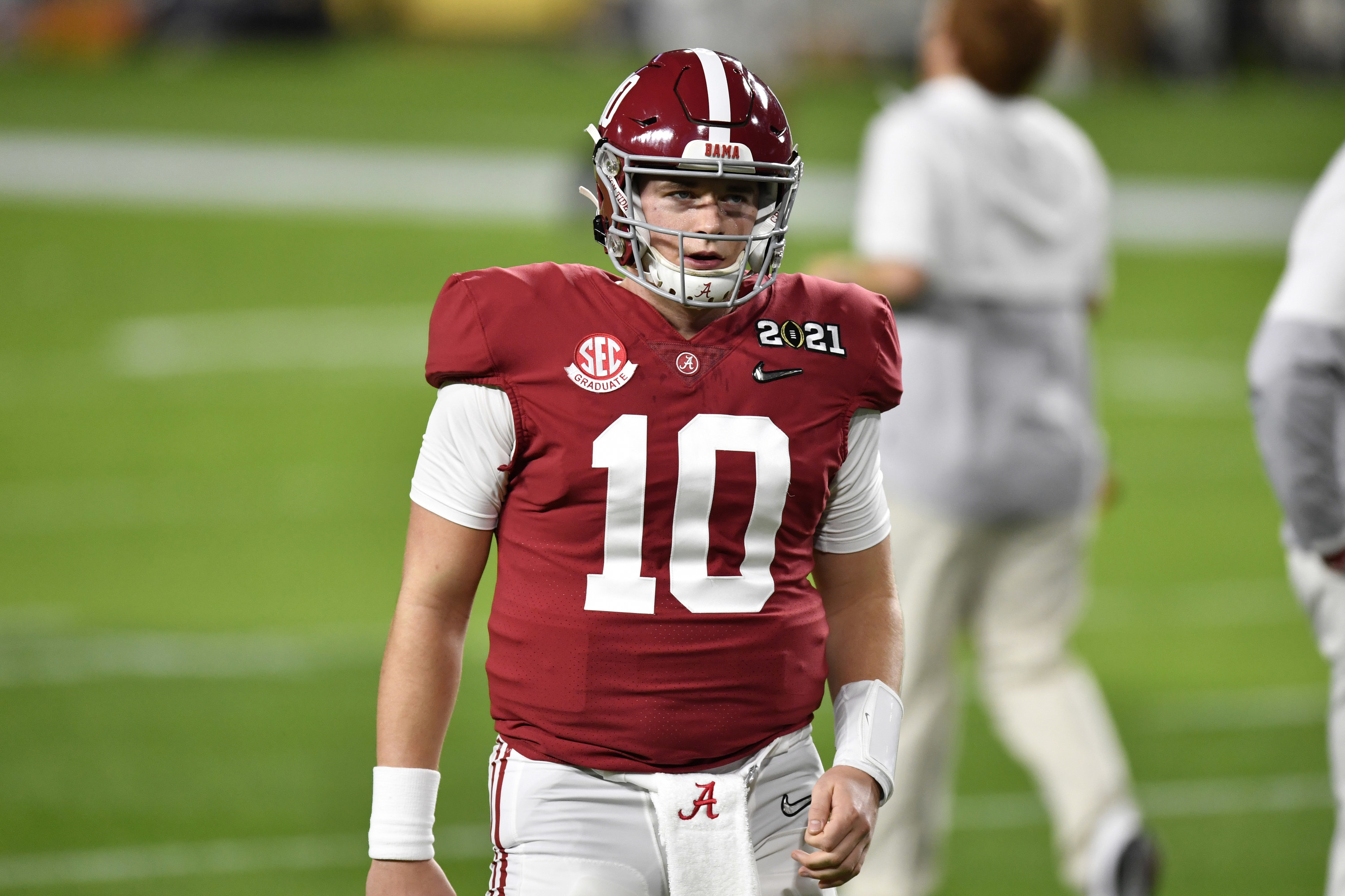 Mac Jones on the field in an Alabama uniform