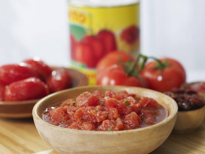 Canned diced tomatoes in a bowl.