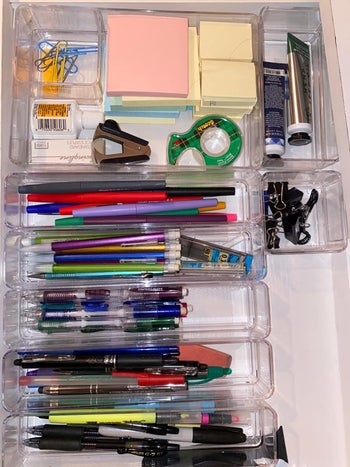 Reviewer photo showing the drawer organizers used for office supplies 