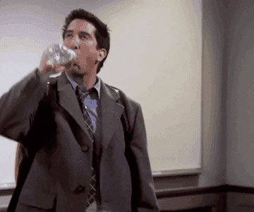 Ross from &quot;Friends&quot; spraying himself with a water bottle to cool down