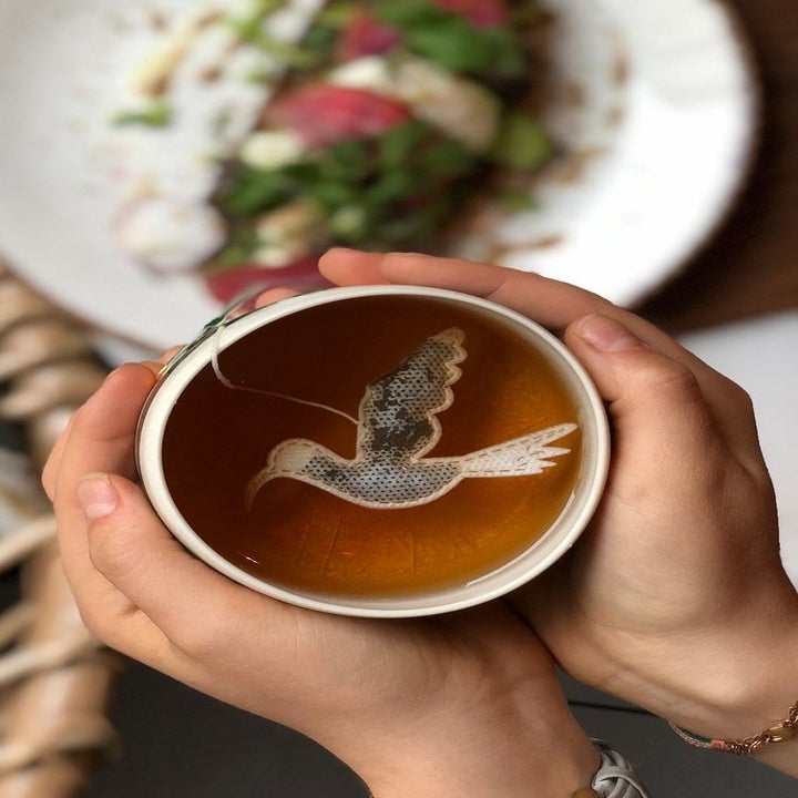The tea bag in a mug of tea
