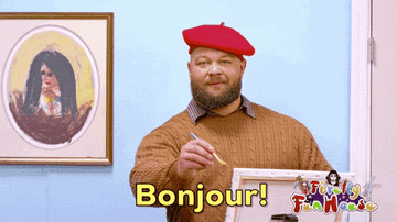 A model in a red beret saying &quot;Bonjour!&quot;