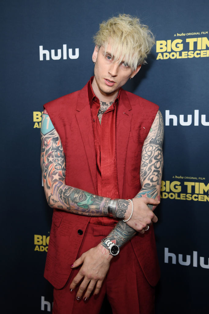 WATCH Machine Gun Kelly Undergoes Hours Of MakeUp To Remove His Tattoos  For The  Capital
