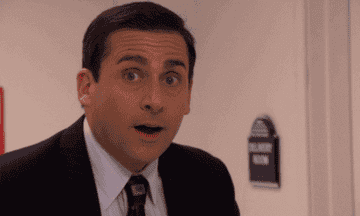 A pleasantly surprised and curious Michael Scott from &quot;The Office&quot;