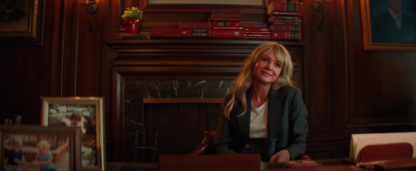 Carey Mulligan smiling in "Promising Young Woman"
