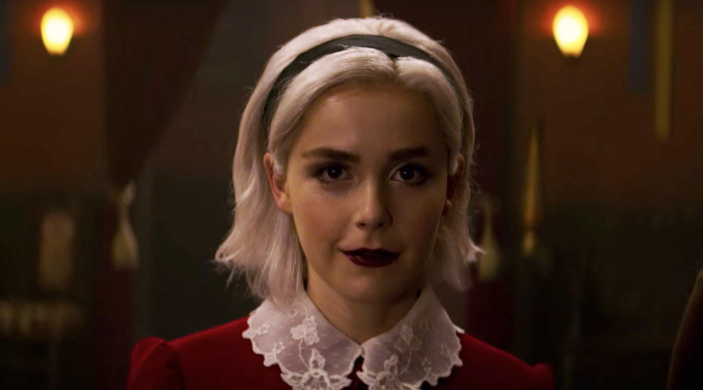 And Kiernan Shipka in a short, white obvious bob wig