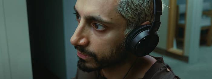 Riz Ahmed wearing headphones in "Sound of Metal"