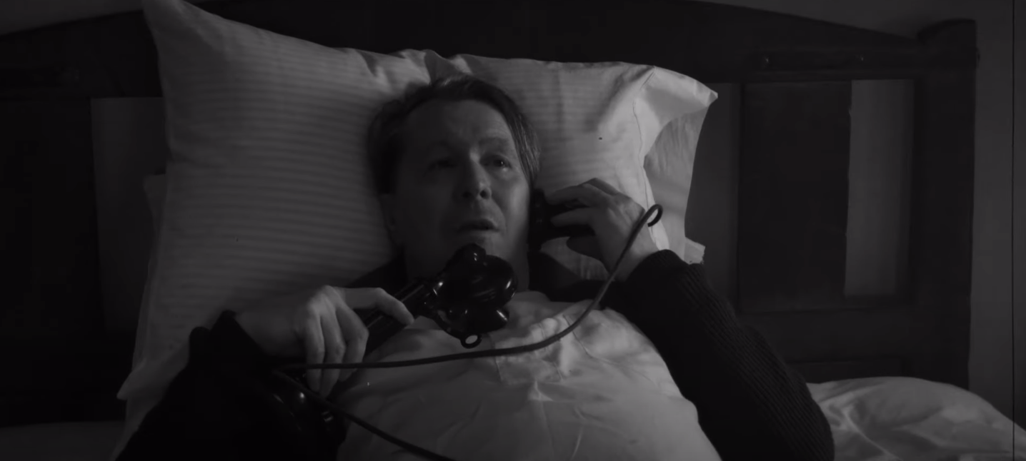 Gary Oldman laying in bed in &quot;Mank&quot;