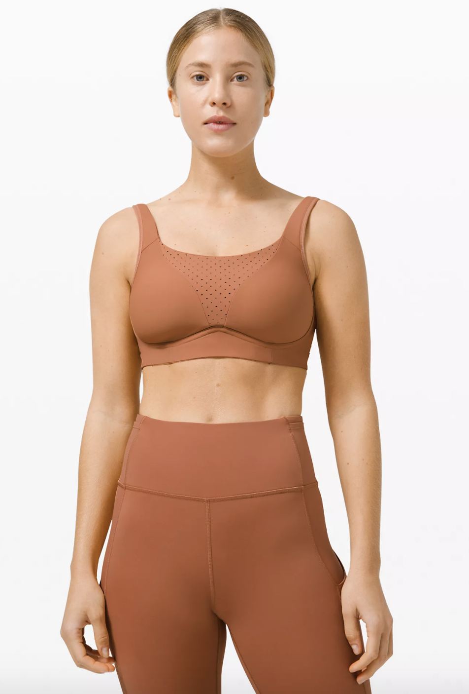 model wearing sports bra and leggings