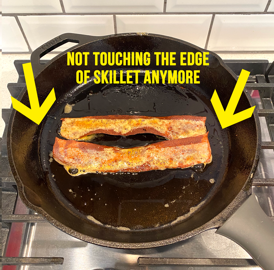 Bacon has shrunk down and not touching the edge of the skillet anymore