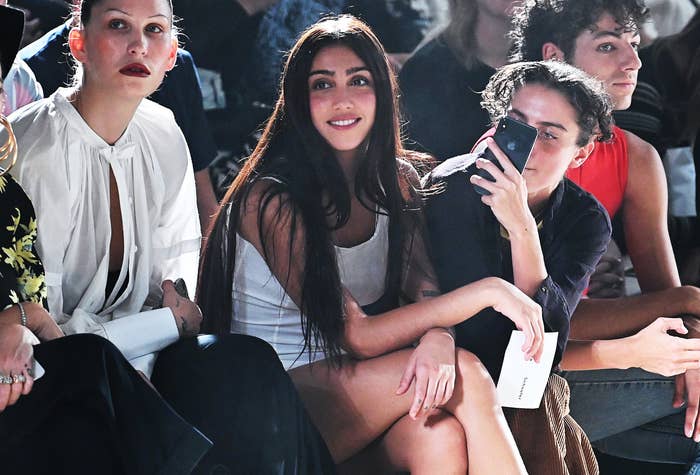 Lourdes smiles while attending a fashion show