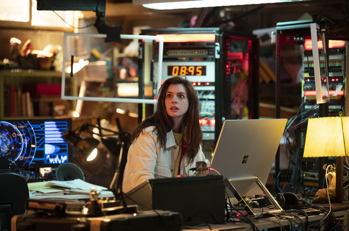 Anne Hathaway sits in front of a computer in the Amazon series Solos