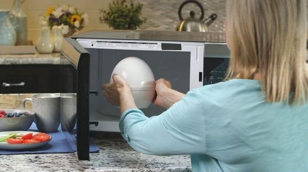 The egg cooker, which is shaped like a very large plastic egg and which is placed into the microwave