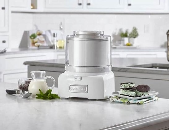 The ice cream maker, which sits on the countertop, in white